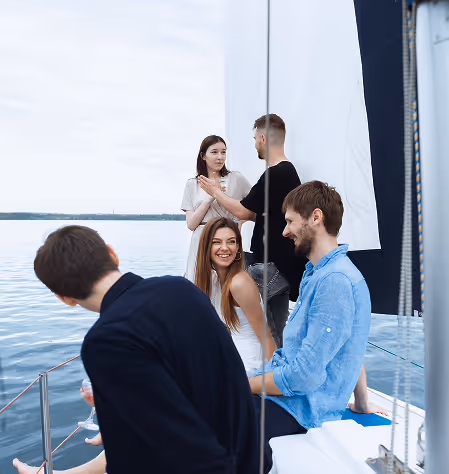A sailboat on a calm lake representing certified sailing courses.